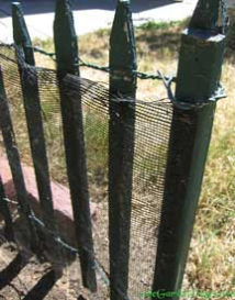 Shade cloth on a small garden fence for temporary shade